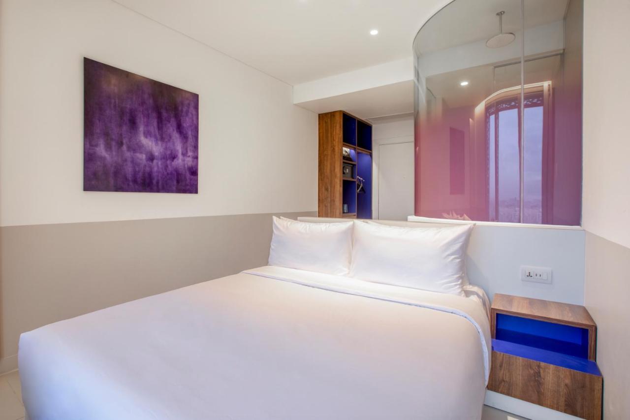 Wink Icon Hotel Danang Riverside - Luxury Suites - 24Hrs Stay & Rooftop Pool Bar Екстериор снимка