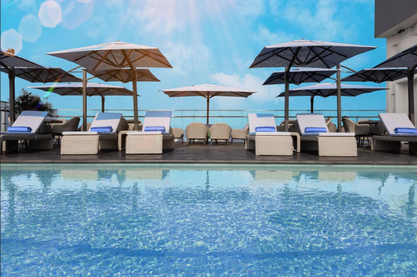 Wink Icon Hotel Danang Riverside - Luxury Suites - 24Hrs Stay & Rooftop Pool Bar Екстериор снимка